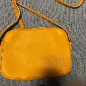 Mustard purse. Used.
